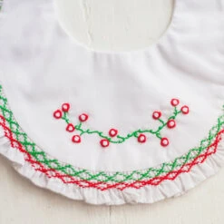 Smocked Ruffle Holiday Bib -Baby Clothes Sales Photo Jan 11 3 41 46 PM 36941.1638807083